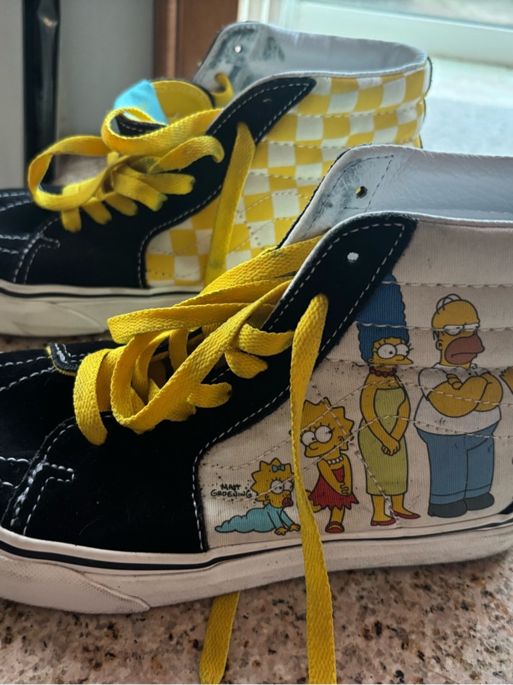 Vans Simpsons Checkerboard High-Top Sneakers in Black, Yellow, White